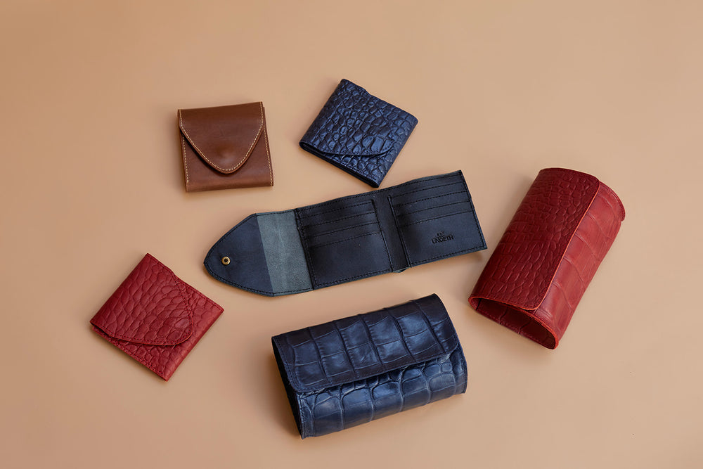 
            
                Load image into Gallery viewer, UnoEth Dessi Leather Tri-fold Wallet - Handmade in Ethiopia
            
        